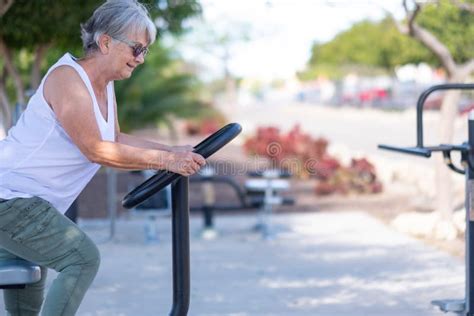 Smiling Senior Woman Exercising At Outdoors Gym Playground Equipment Stock Image Image Of