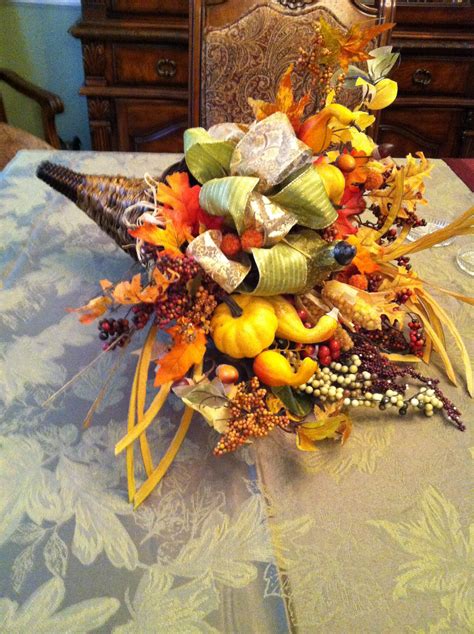Celebrate Autumn With A Cornucopia Filled With Flowers Pumpkins And