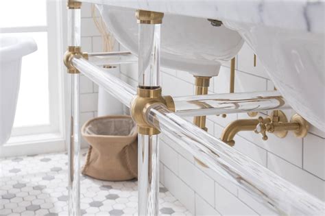 A washstand or basin stand is a piece of furniture consisting of a small table or cabinet, usually supported on three or four legs, and most commonly made of mahogany, walnut, or rosewood, and made for holding a wash basin and water pitcher. 60" Wide Double Wash Stand Only with Satin Gold Finish