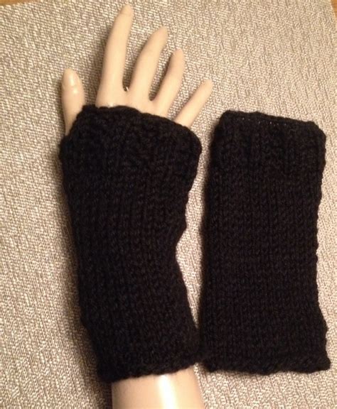 They fit in your purse or back pocket, and you can slip them on whenever it gets too. Black Knit Wrist Warmers with Thumb Opening by ...
