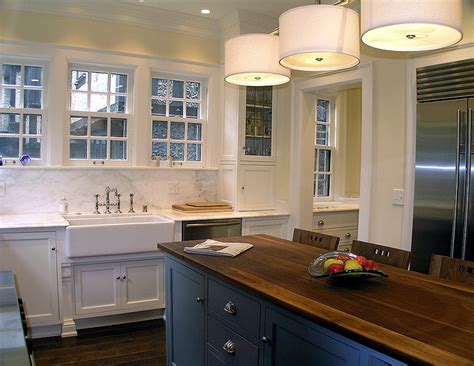 It can help brighten a kitchen and or kitchen cabinets and counter tops separated by a tile backsplash. If we do the butcher block wood countertop and white ...