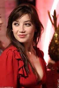 daisy lowe showcases her curves in a plunging red mini dress as she films online chat show