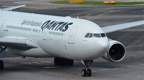 Qantas Airbus A330 Widebody Jet Taxiing At Changi Airport Editorial