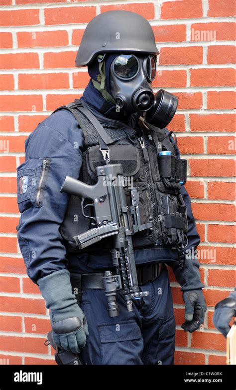 Police Swat Officer In Gas Mask With Mp5 Machine Gun Real Police Stock