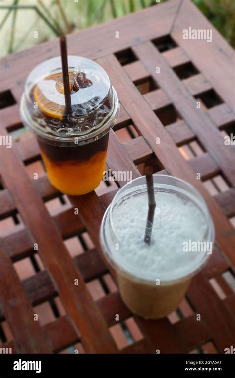 Iced Americano Coffee With Fresh Orange Juice Drink Stock Photo Stock