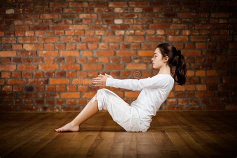 Girl Exercising Yoga Against Brick Wall Stock Image Image Of Horizontal Healthcare