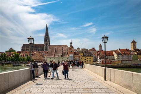 Tourists Visiting The Old Town Of Regensburg Ratisbon In Germany