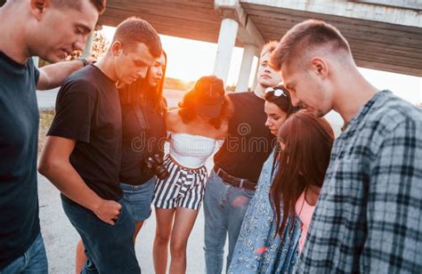Talking And Laughing Group Of Young Cheerful Friends Having Fun Together Stock Image Image Of