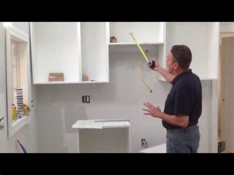 In this video from bunnings warehouse on how to install kitchen wall. How to assemble & install IKEA Sektion wall cabinet - YouTube