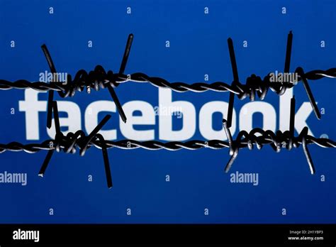 Facebook Social Network Logo Behind Barbed Wire The Concept Of