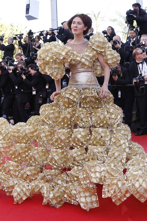Cannes Day Marion Cotillard Eva Longoria And An Extraordinary Dress Made Of Biscuit Trays
