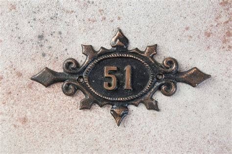 Premium Photo Old Metal Home Number Sign