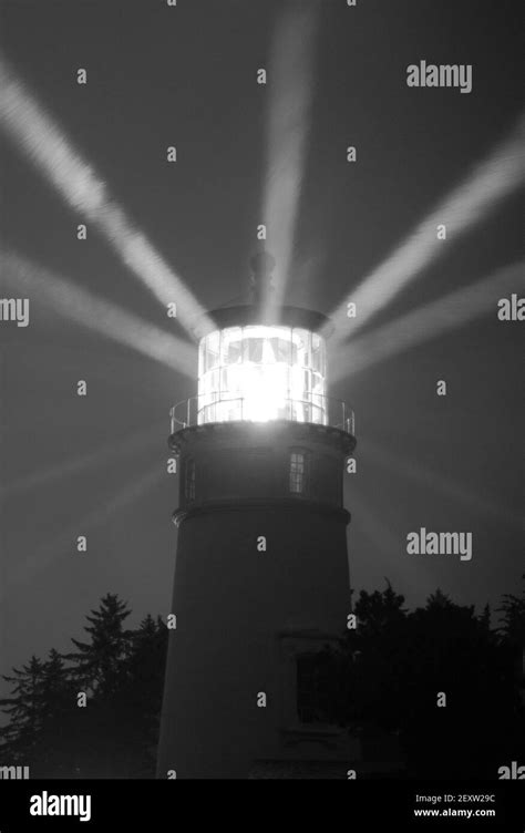 Lighthouse Beams From Lens Rainy Night Pillars Of Light Stock Photo Alamy