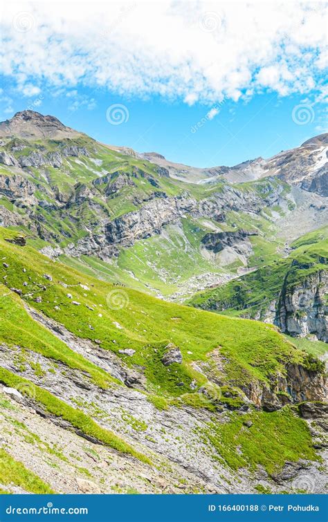 Vertical Picture Of Amazing Alpine Landscape Photographed On A Sunny