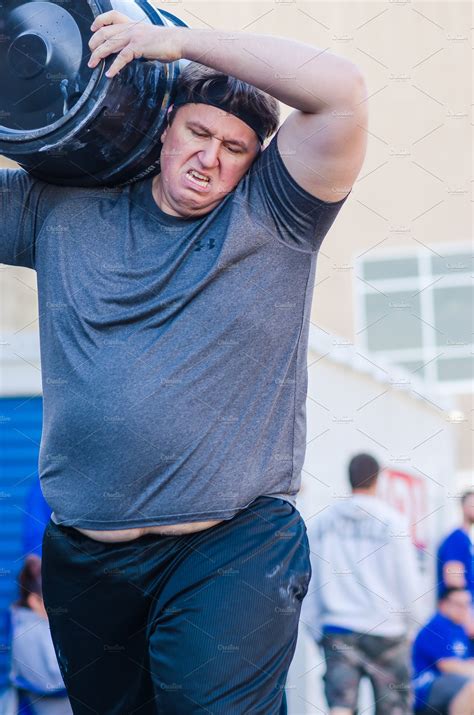 Crossfit Barrel Carry Overweight Man High Quality Sports Stock Photos