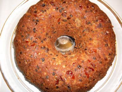 This one uses naturally dried fruits. Real Fruit Cake, made with dry fruit. From Alton Brown ...