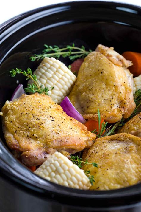 More easy crock pot chicken recipes i used boneless skinless chicken thighs and since i don't have a crock pot i cooked it in my dutch oven in a 275 degree oven for 3 hours. Slow Cooker Chicken Thighs with Vegetables | Jessica Gavin