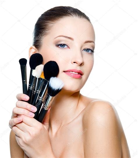 Beautiful Young Woman Holding Make Up Brushes — Stock Photo
