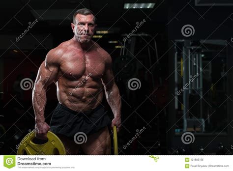 Strong Mature Man With Relief Body Posing In Gym Stock Image Image Of Caucasian Press