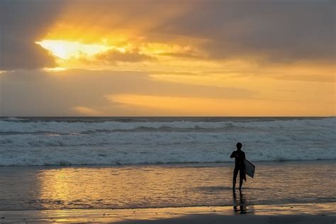 Free Images Man Beach Sea Coast Sand Ocean Horizon Person Cloud Sky Sun Sunrise