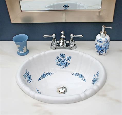 Blue Amaranth Decorated Sink With Soap Dispenser And Wedgewood Tumbler Traditional Bathroom