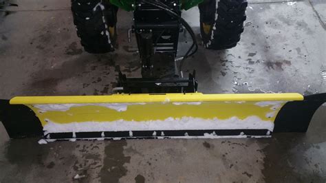 Installing Rubber Wings And Cutting Edge On A John Deere Snow Blade
