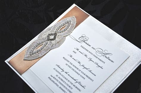 A Wedding Card With An Intricate Design On It