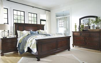 This king sleigh bed will embrace any master bedroom with it's curved headboard, bold panels and turned bun feet. SIGNATURE ASHLEY- Item Series #: B697-BEDROOM SET // Ogle ...