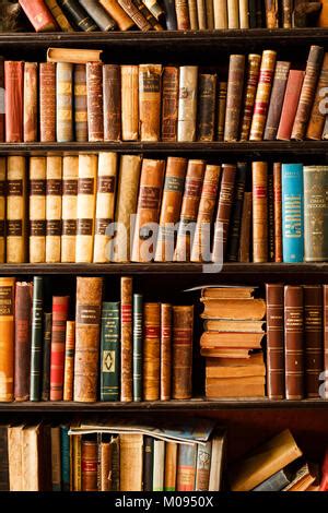 Very Old And Dusty Books Spine In A Heap On A Bookshelf Stock Photo Alamy