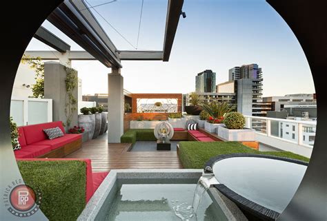 A new seattle modern house designed by chadbourne + doss architects houses a couple and their 18 bicycles. Penthouse rooftop garden by Paal Grant Landscapes ...