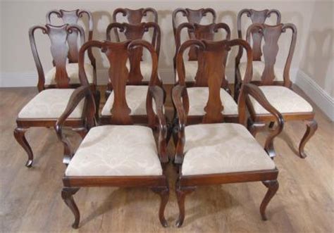 The small rolled back is a classic design element. Queen Anne Dining Chairs