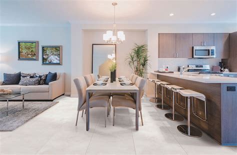 Modern Living Space With Dining And Open Concept Kitchen Floor Tiles
