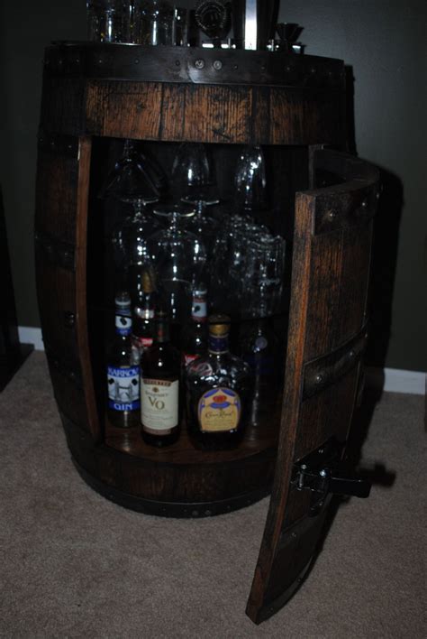 whiskey barrel liquor cabinet with glass shelf and lazy susan whiskey barrel barrel table decor