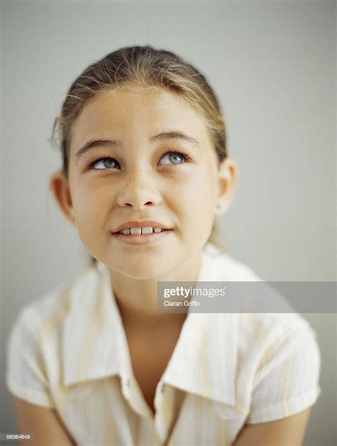 Closeup Of A Girl Looking Up High Res Stock Photo Getty Images