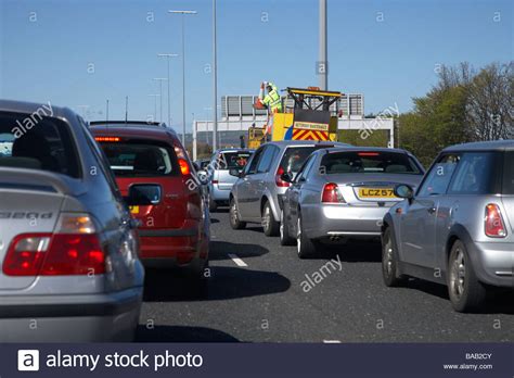 Motorway Maintenance Crew Working On A Motorway With Traffic Jams And Disruption M2 Outside