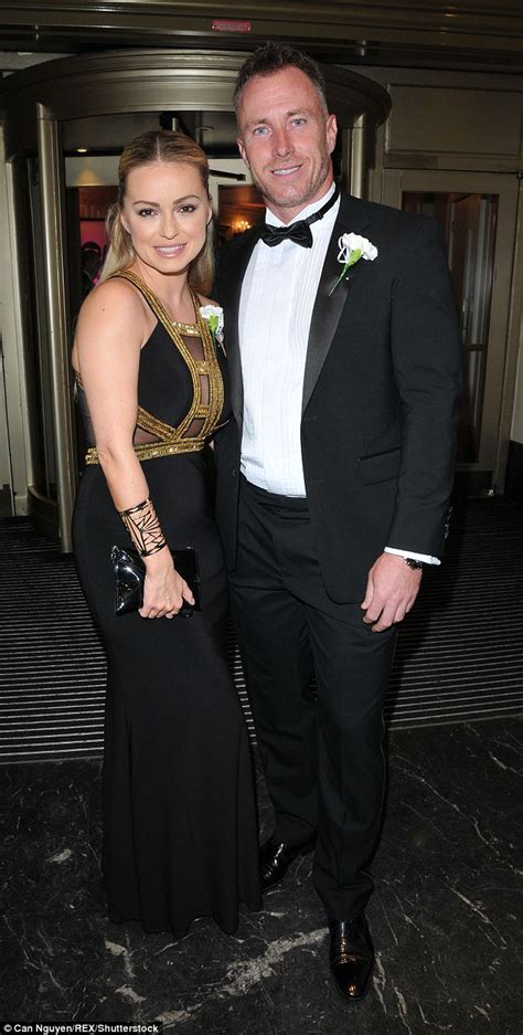 Ola Jordan Dazzles In A Cleavage Baring Black Dress With Husband James In London Daily Mail Online