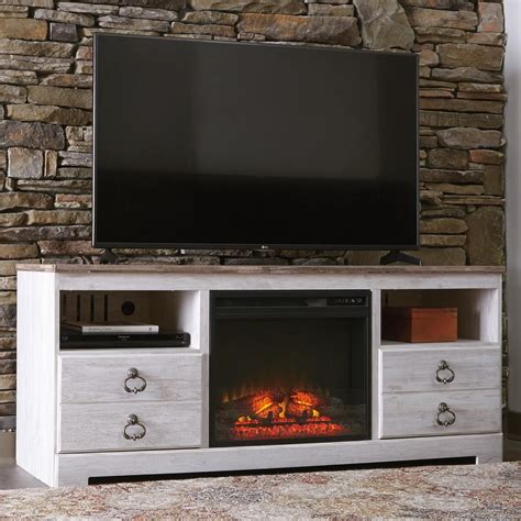 Signature Design By Ashley Willowton Large Tv Stand With Fireplace