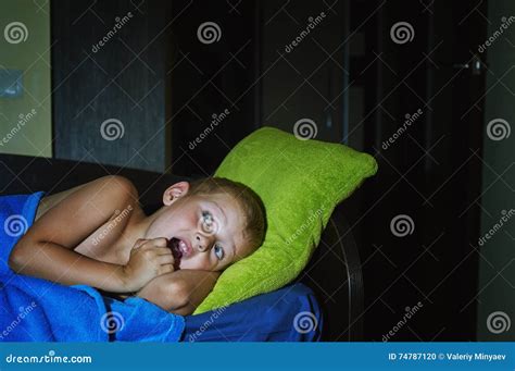 A Scared Little Boy Afraid In Bed At Night Childhood Fears Stock