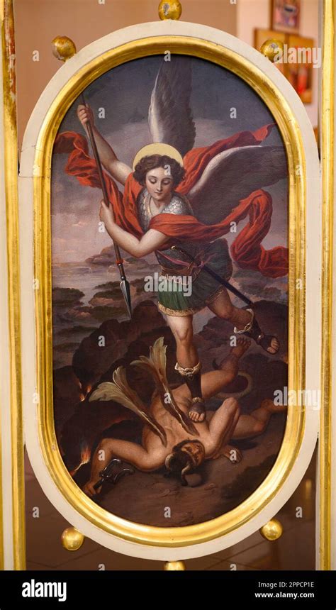 An Icon Of Saint Michael The Archangel Defeating The Devil Stock Photo