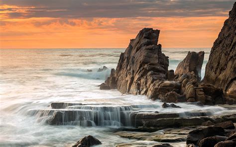 Sea rocks landscape sunset ocean waves wallpaper | 1920x1200 | 153652 | WallpaperUP