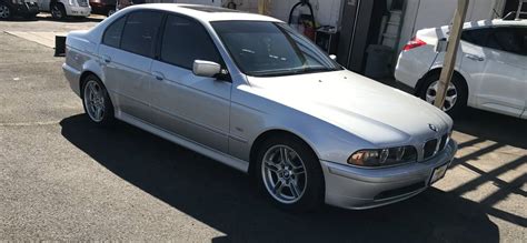 This bmw is grey with 2 tone grey and black interior. 2001 BMW 540i Sport with 1,890 Miles - German Cars For Sale Blog