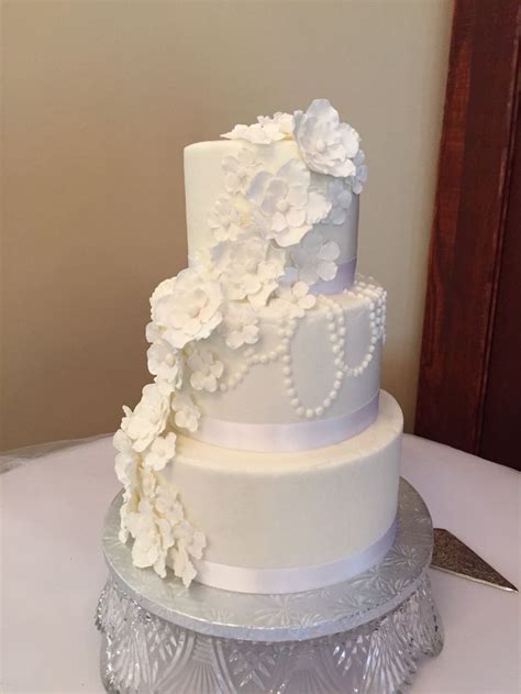 Small Three Tier Round Buttercream Wedding Cake With Pearl Detail And