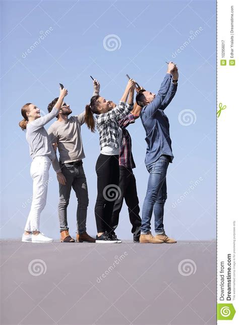Rear View Happy Friends Doing A Selfie Stock Image Image Of Holding