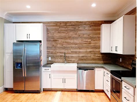 Laminate flooring retailers agree that using laminate flooring on walls is a good idea. Laminate Flooring Backsplash (It looks like WOOD!) - Bower ...