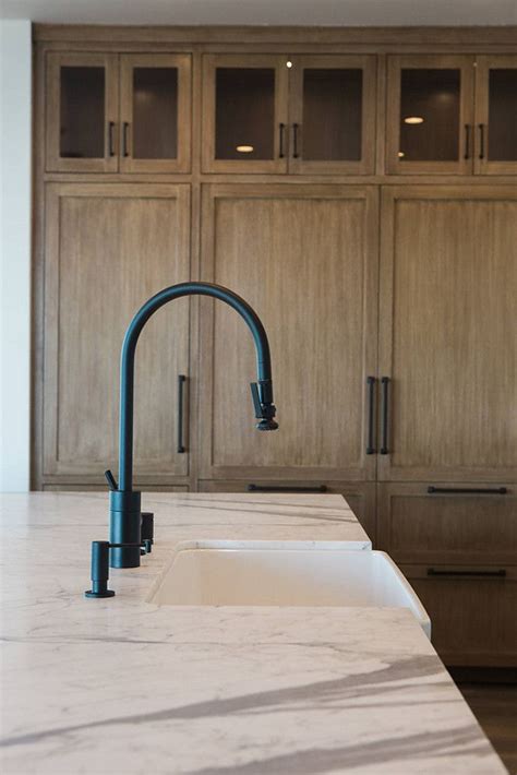 Do you have a traditional, farmhouse kitchen that would look amazing with an antique look faucet? Cabinet color...Matte Black Kitchen Faucet with farmhouse ...