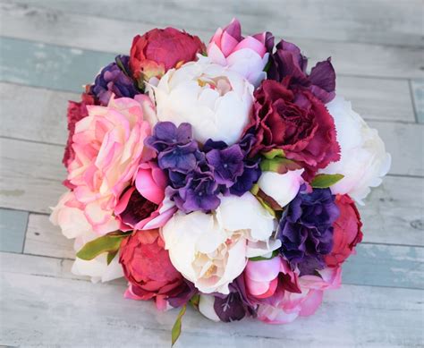 Natural Touch Purple Roses And Orchids Bouquet