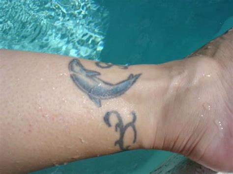Https://tommynaija.com/tattoo/dolphin Tattoo Designs On Wrist