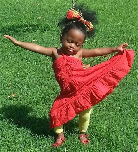 Enjoy The Season Like This Adorable Little Girl Dancing Across The Lawn