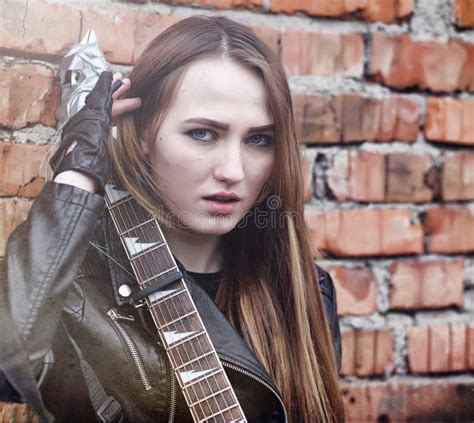 Beautiful Young Girl Rocker With Electric Guitar A Rock Musicia Stock