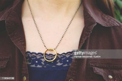 Chain Around Neck Photos And Premium High Res Pictures Getty Images